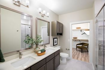 Framed glass mirrors in bathrooms